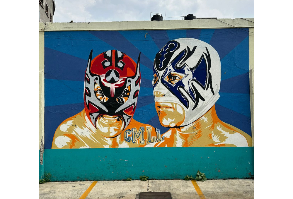 Mural de luchadores Último Guerrero y Atlantis.